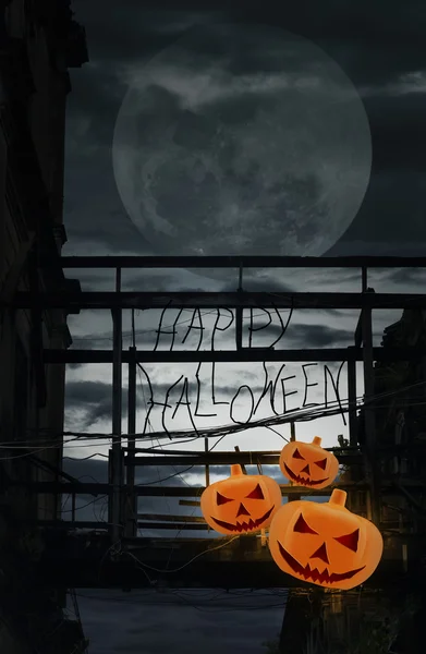Halloween pumpkin on damaged wooden bridge, Halloween background