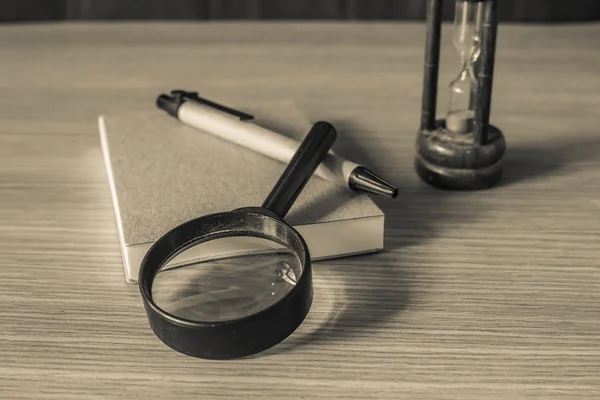 Magnifying glass with black and white.