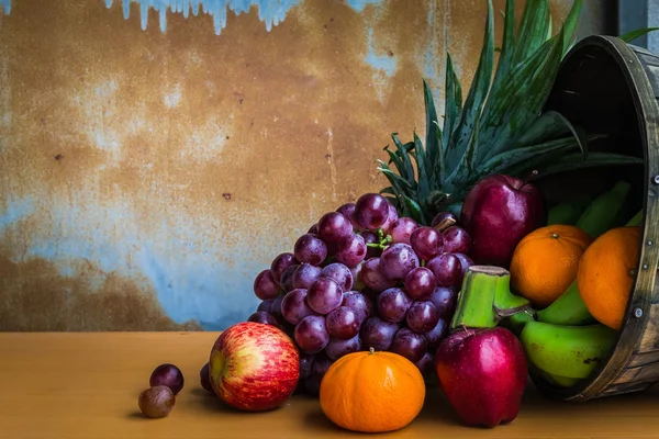 Fruits on a wooden floor.