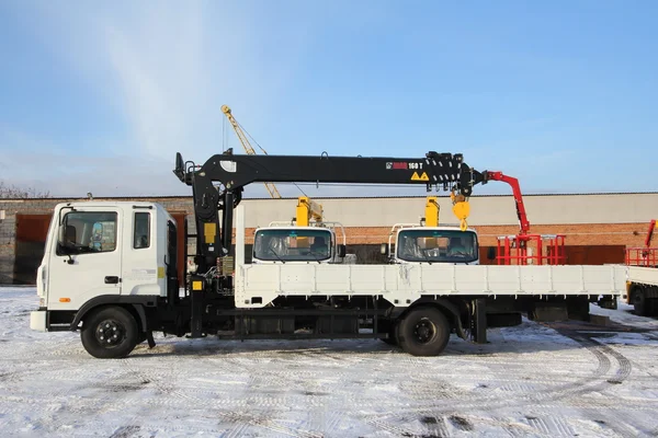 KEMEROVO, RUSSIA - March 14, 2015: great truck crane standing on a construction site