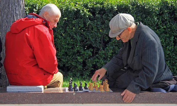 Men are playing chess outdoor in Yekaterinburg, Russia