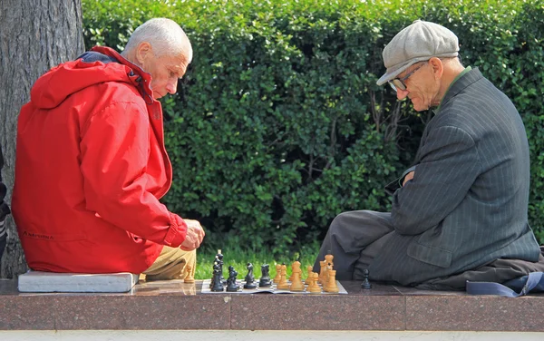 Men are playing chess outdoor in Yekaterinburg, Russia