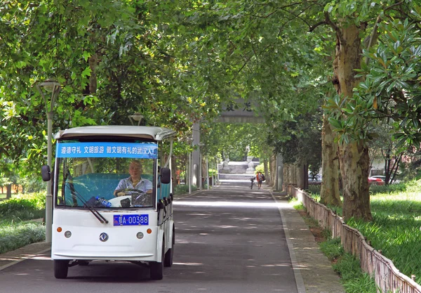 Driver is returning for passengers in park of Wuhan, China