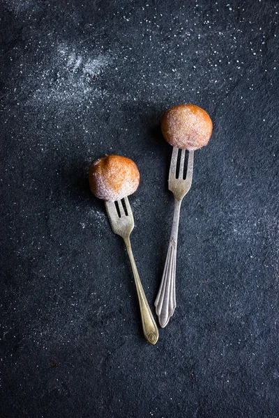 Sweet homemade donuts with icing sugar