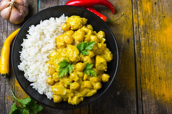 Spicy chicken and chickpeas curry and rice