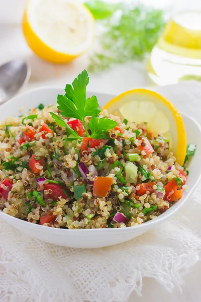 Tabbouleh salad with quinoa, parsley and vegetables