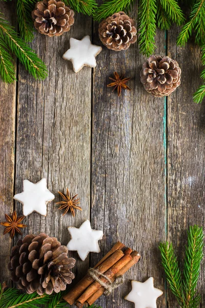 Christmas background with fir branches, pine cones, christmas co