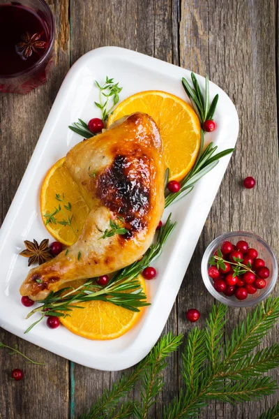 Roasted chicken with cranberry sauce for Christmas dinner
