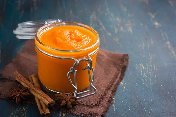Spicy pumpkin pudding in glass jar