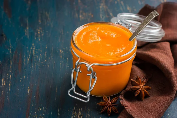 Spicy pumpkin pudding in glass jar