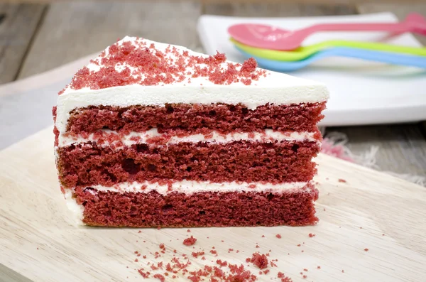 Red velvet cake on a wooden background
