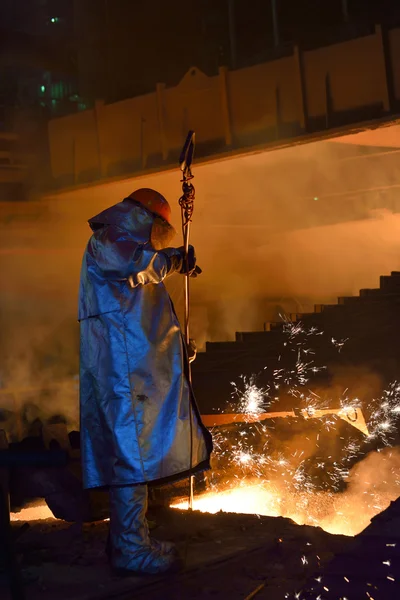 Steel worker in plant