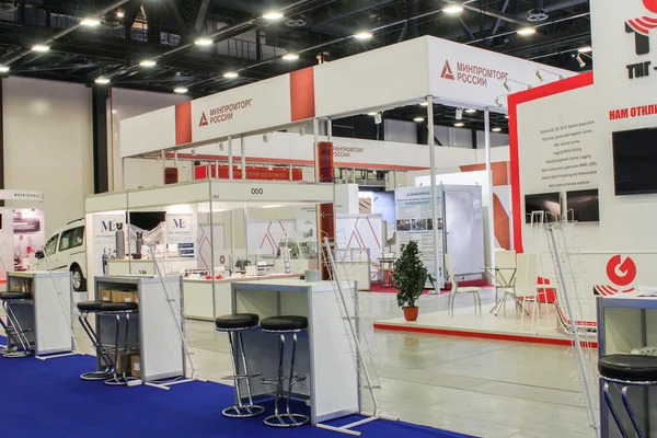 Exhibition interior in white and red colors.