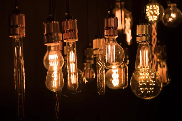 Hanging light bulbs in the dark room