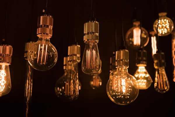 Hanging light bulbs in the dark room