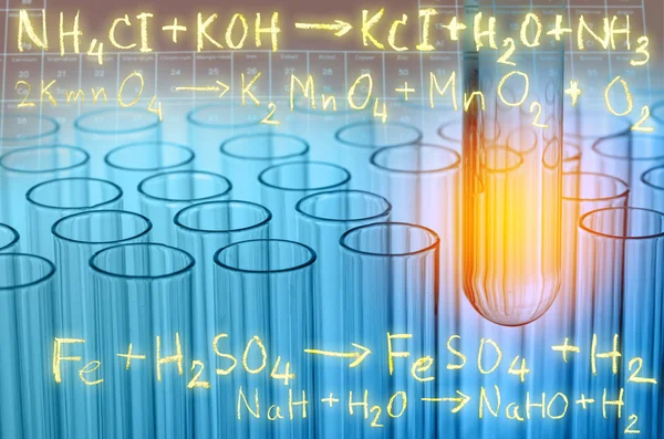 Laboratory test tubes with gold chemical equation background