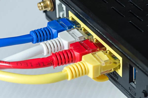 Ethernet cables connect to router or switch