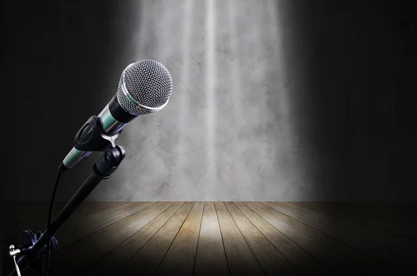 Microphone on black light stage