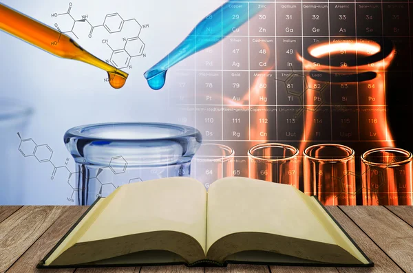Open book with science laboratory test tube background