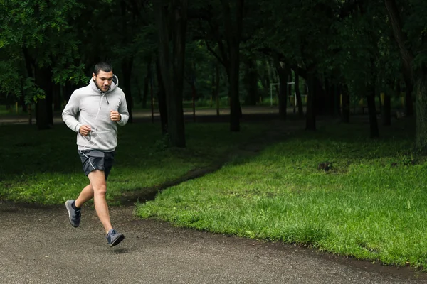 Man running in park