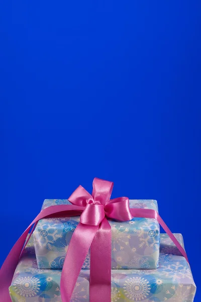 Boxes with gifts on a blue background