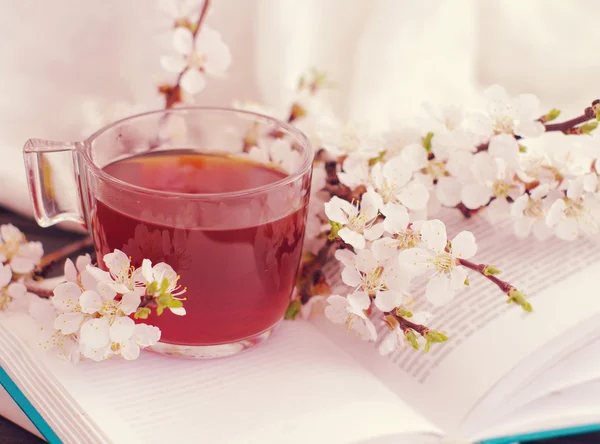 Spring bouquet, book and tea.