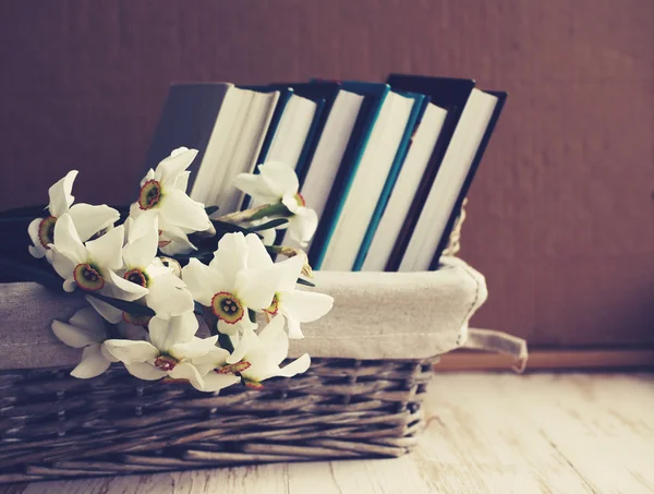 Vintage still life with books and flowers