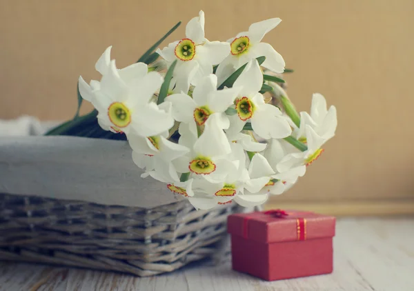 Spring bouquet from narcissus and gift packing for your holiday