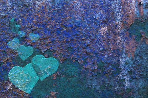 Blue heart on an impressive rusty color background