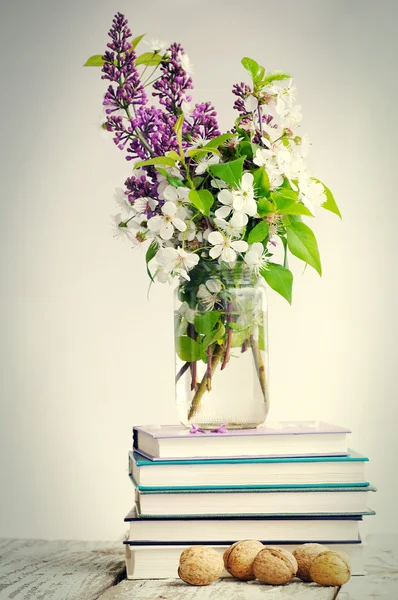 Composition with books and spring flowers