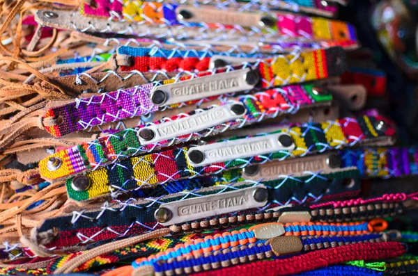 Numerous wristbands with Guatemala sing at the craft market