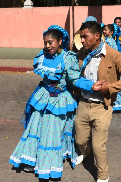 SAN CRISTOBAL DE LAS CASAS, MEXICO, 13 DECEMBER 2015: Couple in traditional dress from Durango state dancing outdoors