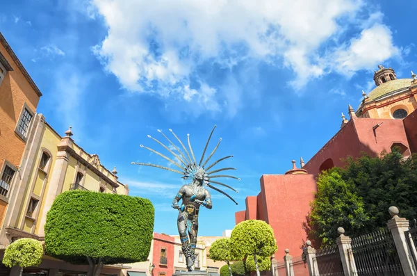 QUERETARO, MEXICO, 10 MARCH 2016: Metal statue of dancing Indian man in Queretaro's downtown.