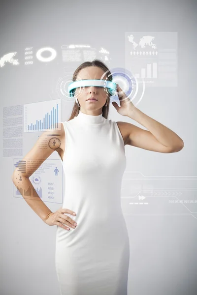 Beautiful woman with futuristic glasses