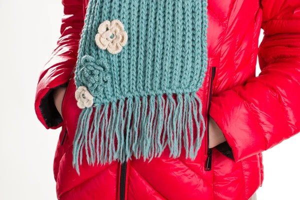 Down jacket and woolen scarf.