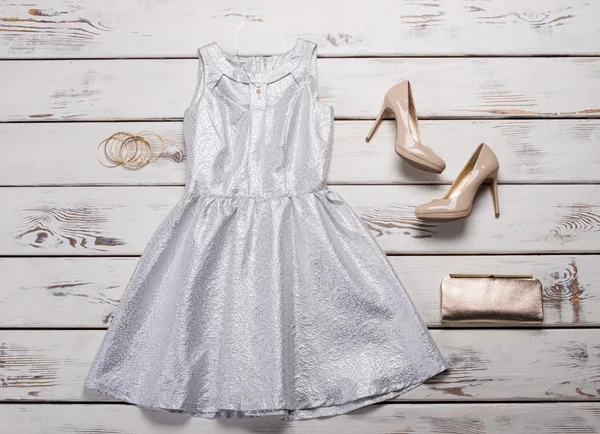 Silver dress with beige shoes