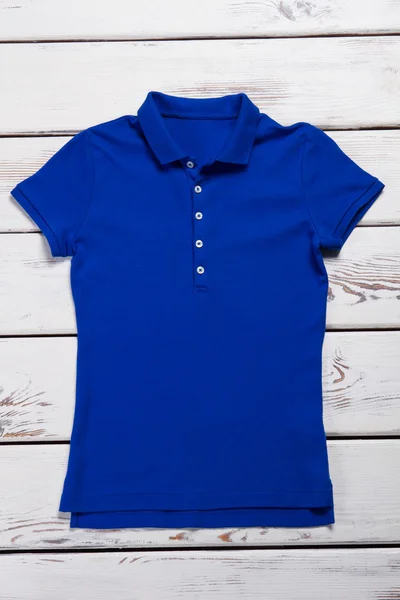 Navy blue polo t-shirt.