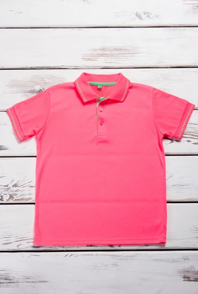 Pink polo t-shirt.