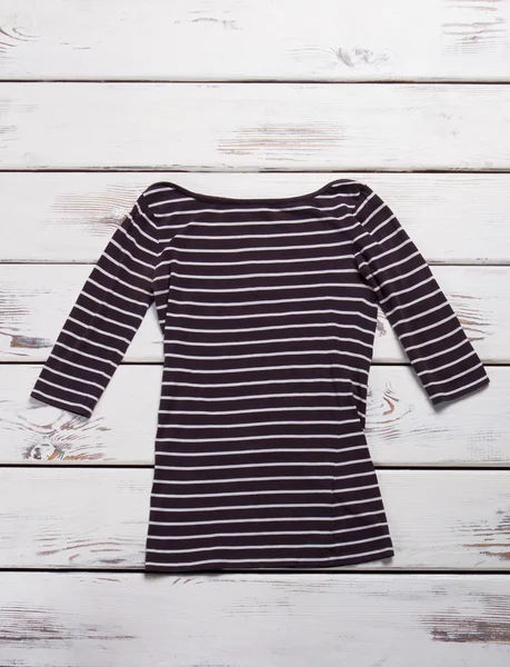 Black and white striped top.