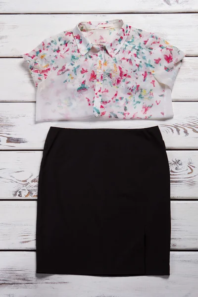 Skirt and shirt with print.