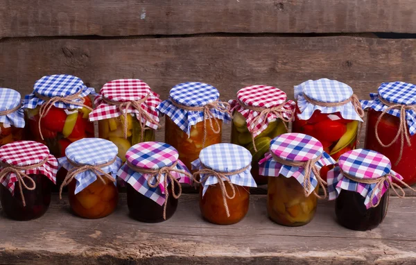 Glass jars with canned vegetables.