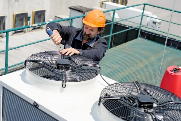 Man repair Air Conditioning