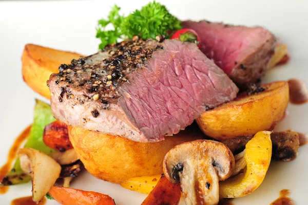 Juicy steak with baked potatoes