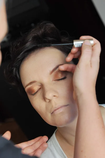Make up artist applying makeup