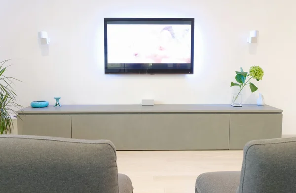 A modern living room with flat tv