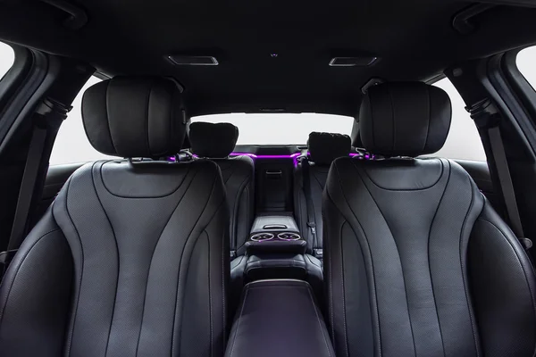 Car interior luxury black with violet ambient light