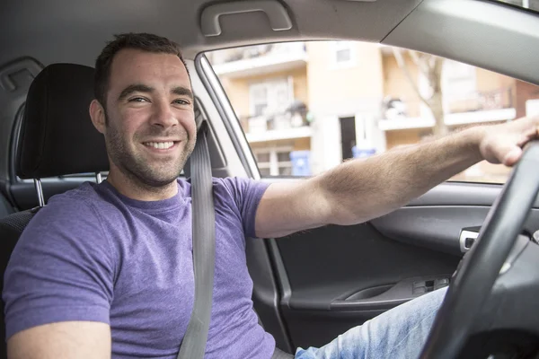 Young owner man with his car