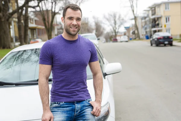 Young owner man with his car