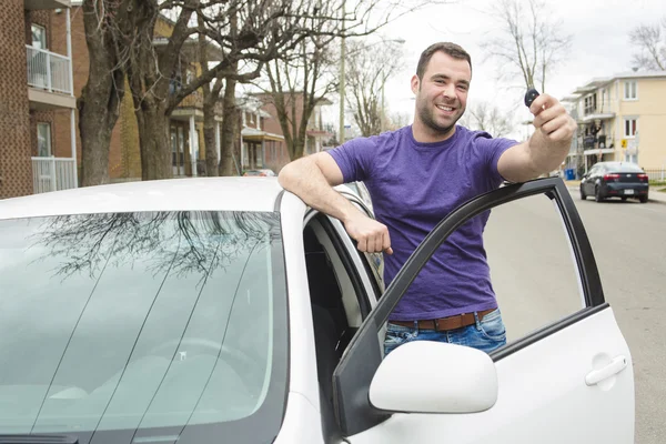 Young owner man with his car