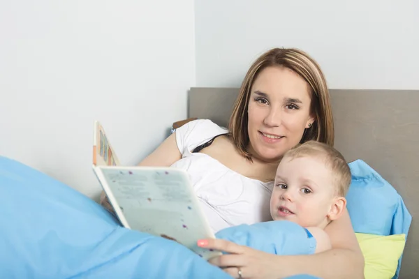 Mother reading a story to her son
